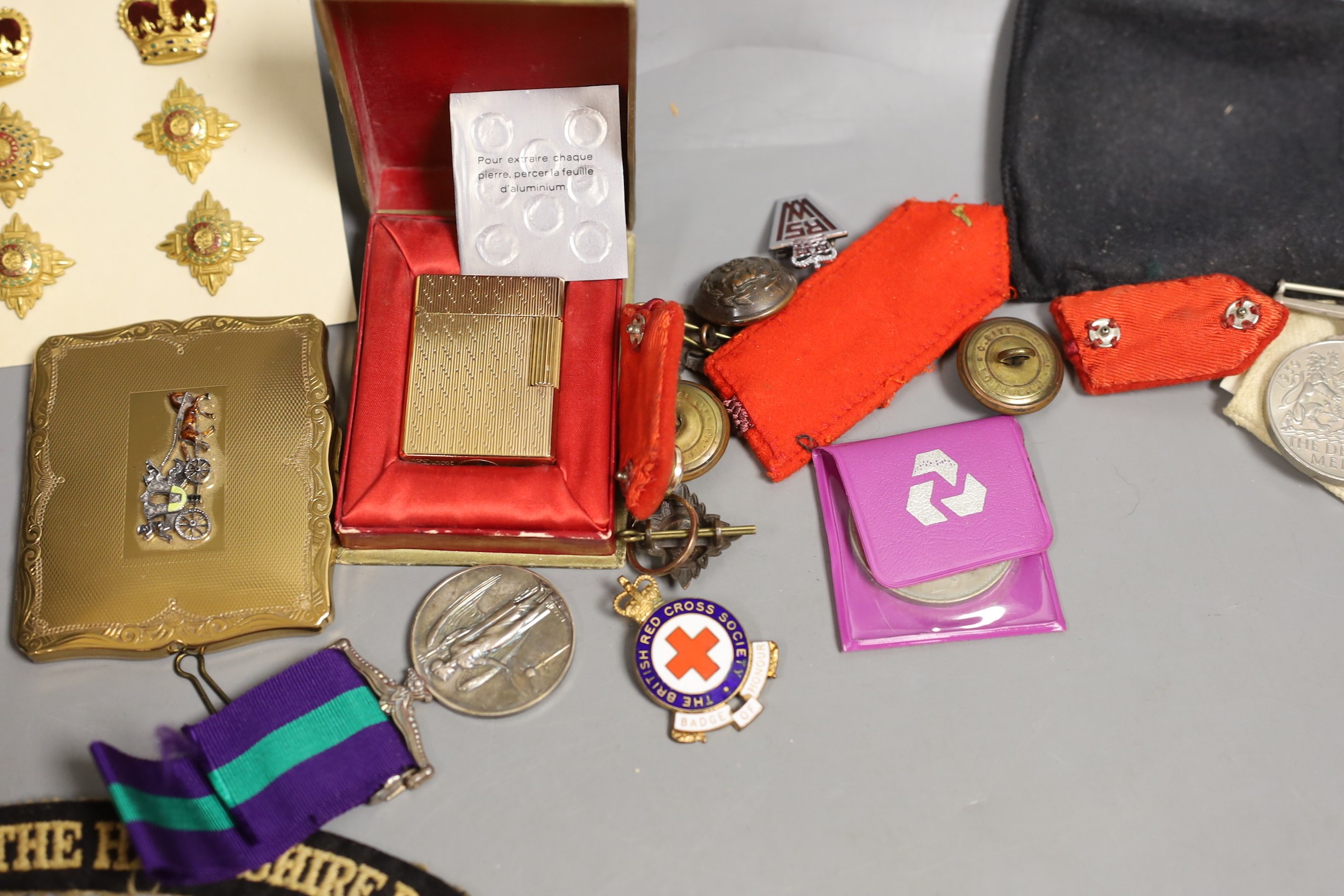 A GSM with Palestine clasp, other medals and militaria, three compacts and cigarette lighter